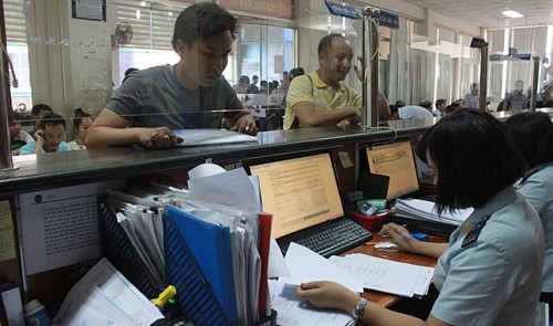Vietnam to simplify tax, customs procedures in 2014 - ảnh 1